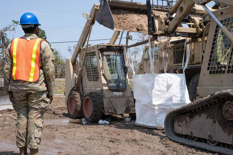 National guard troops help with lsidell recovery efforts